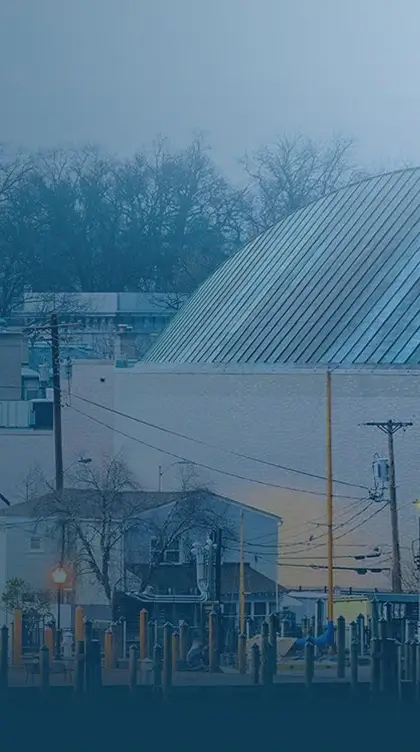 a group of buildings with a dome roof