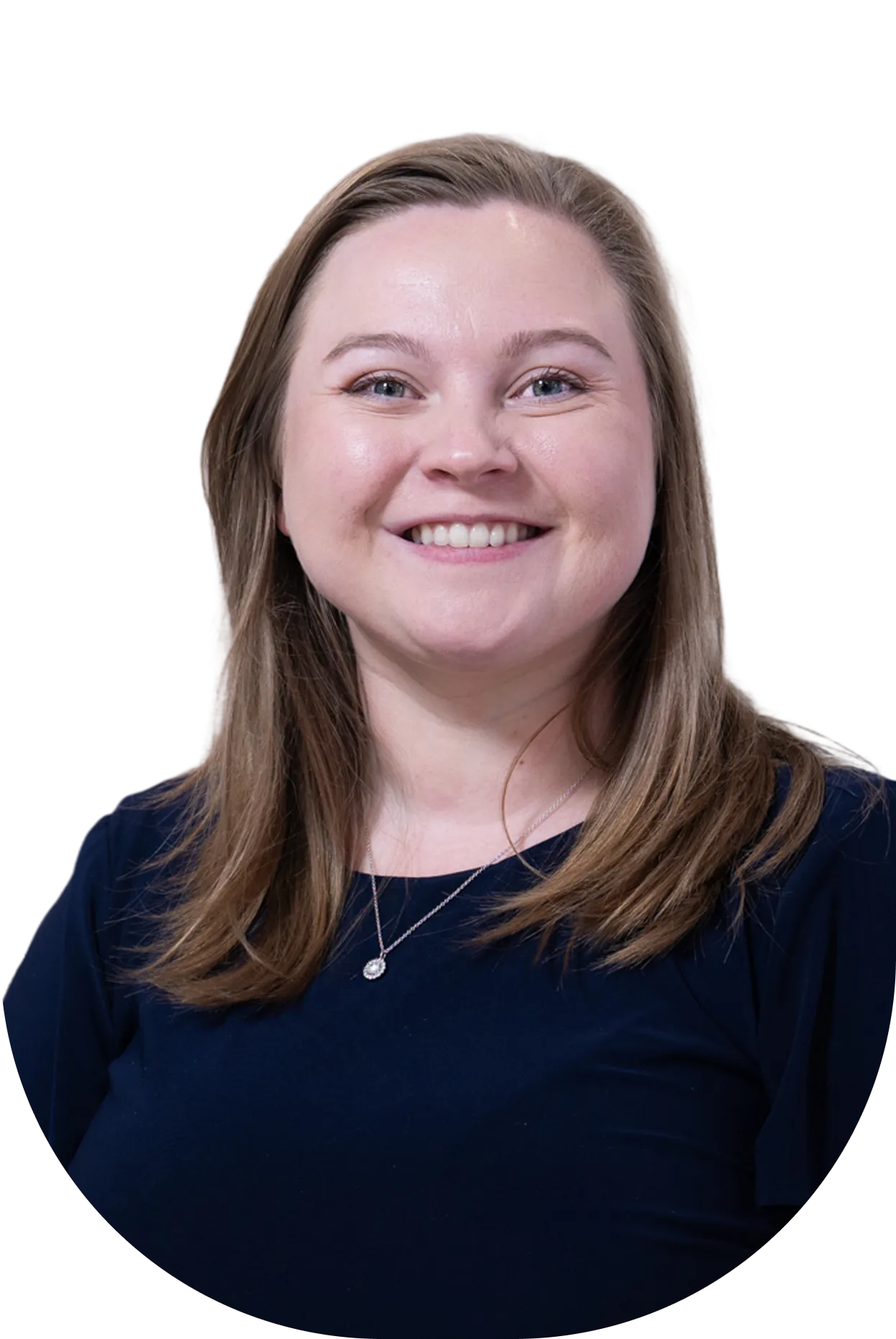 Portrait of a smiling woman with light brown hair, wearing a navy blue top and silver necklace.